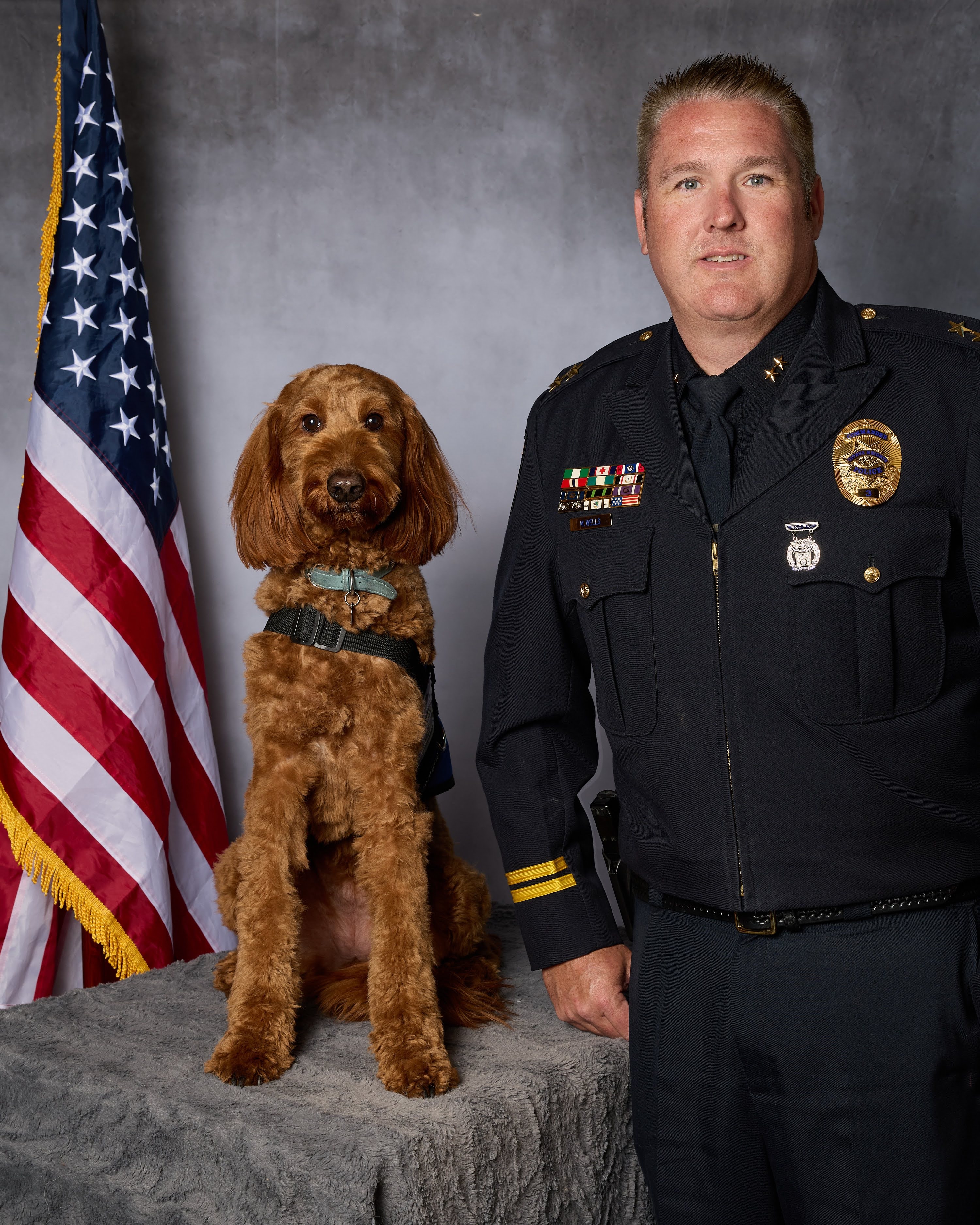 Commander Mike Wells — handler portrait