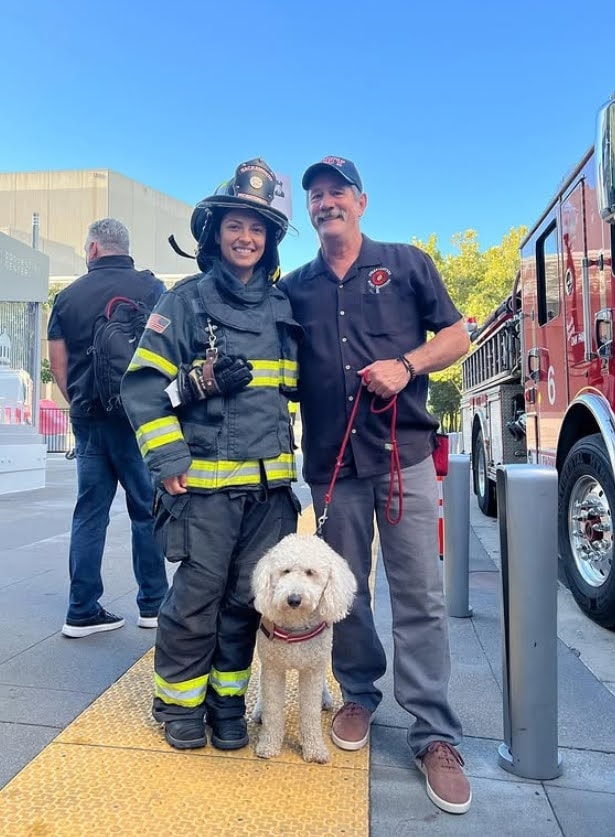 Firefighter connecting with Boots in the rain