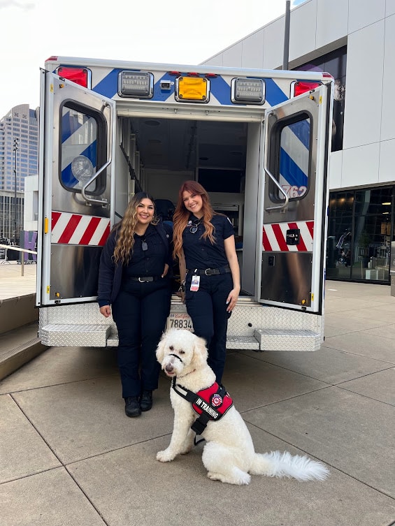 Roseville Fire paramedics with Captain Charlie at the ambulance